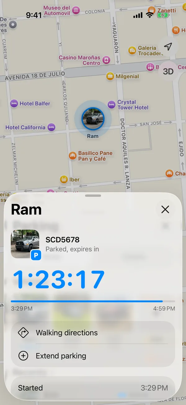 A parked vehicle with the time left, Walking directions and Extend parking