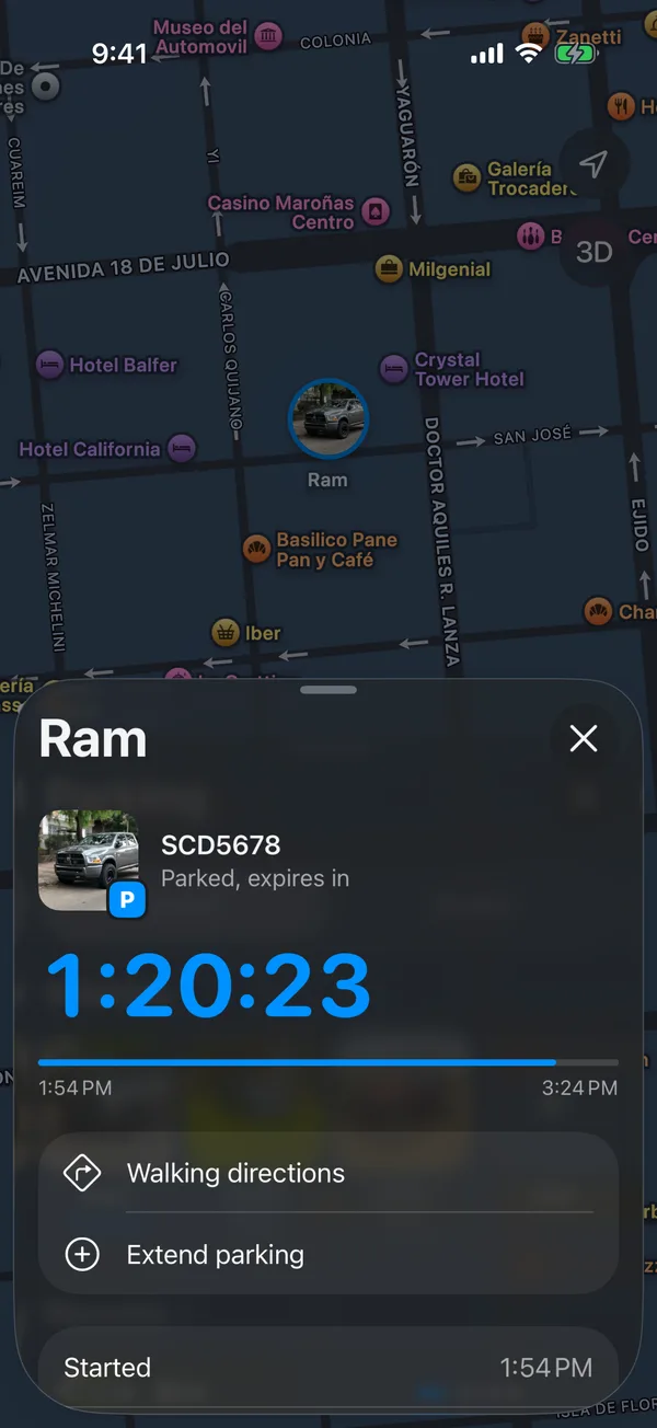 A parked vehicle with the time left, Walking directions and Extend parking